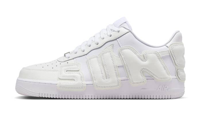 White Nike Air Force 1 sneakers with bold &quot;SUN!&quot; text on the side
