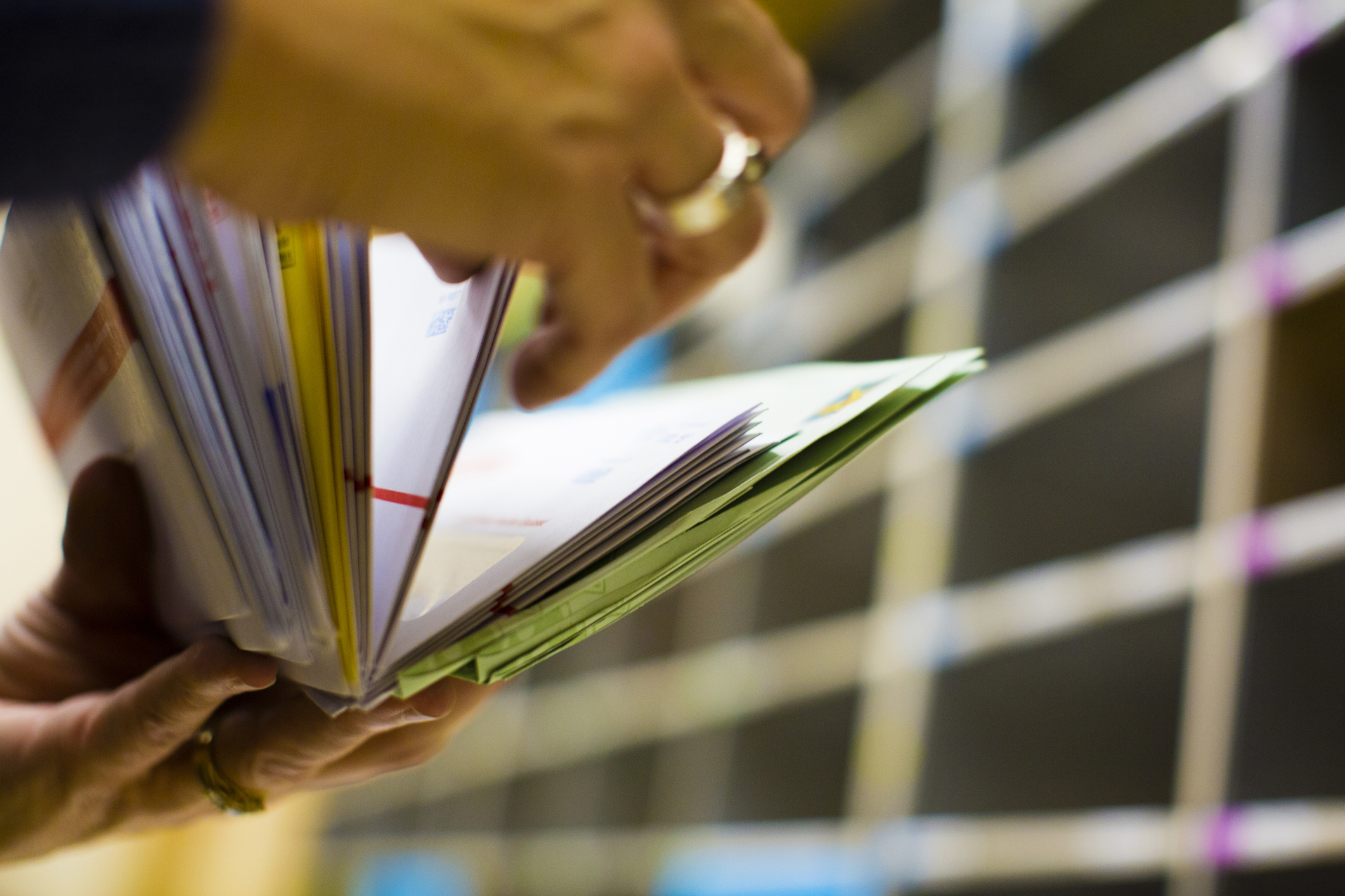 Person flipping through a book with blurred background
