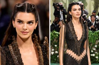Kendall Jenner smiling in an ornate black dress with gold detailing at a gala event