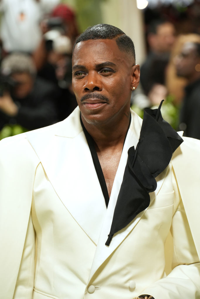 Colman Domingo in a white suit with a black bow at an event