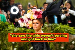 A person wearing a headpiece with large colorful flowers, with photographers in the background. Text: "she saw the girls weren't serving and got back in line"
