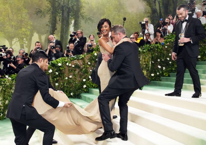 Tyla being lifted up the Met Gala steps