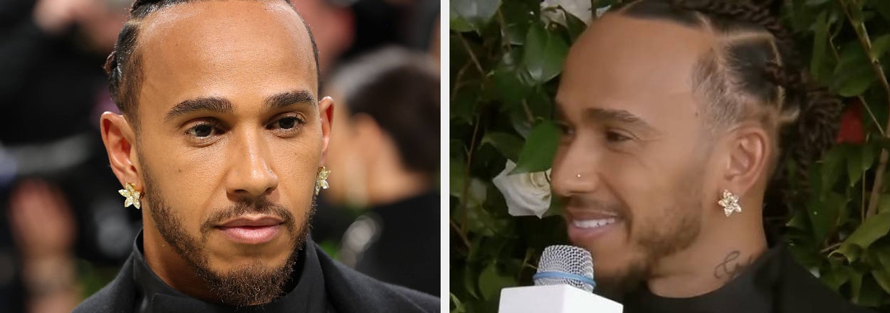Lewis Hamilton in a black outfit with a gold chain collar, giving an interview at an event