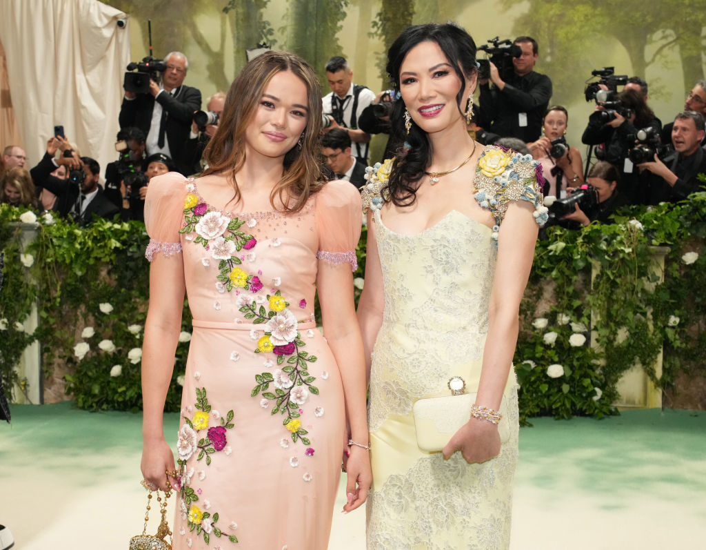 Wendi and Grace posing with floral dresses