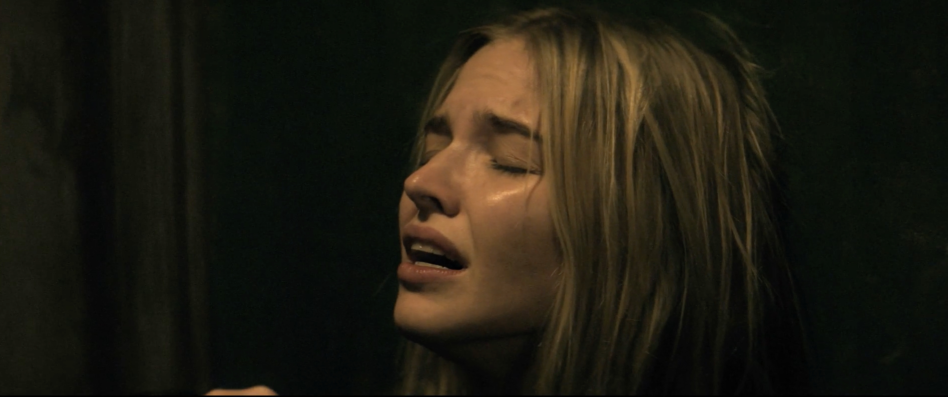 Sasha Luss in distress, expressively crying in Latency