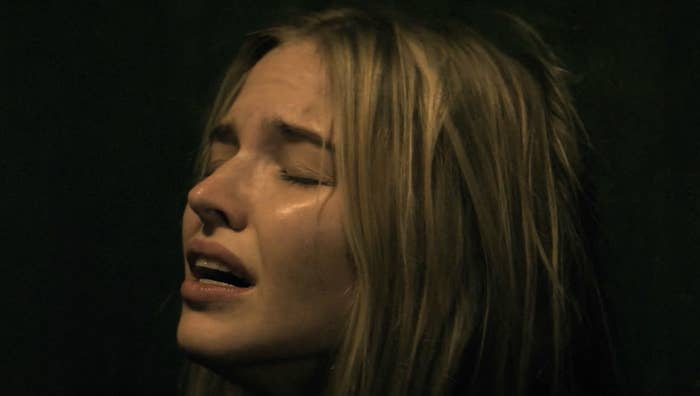 Sasha Luss in distress, expressively crying in Latency