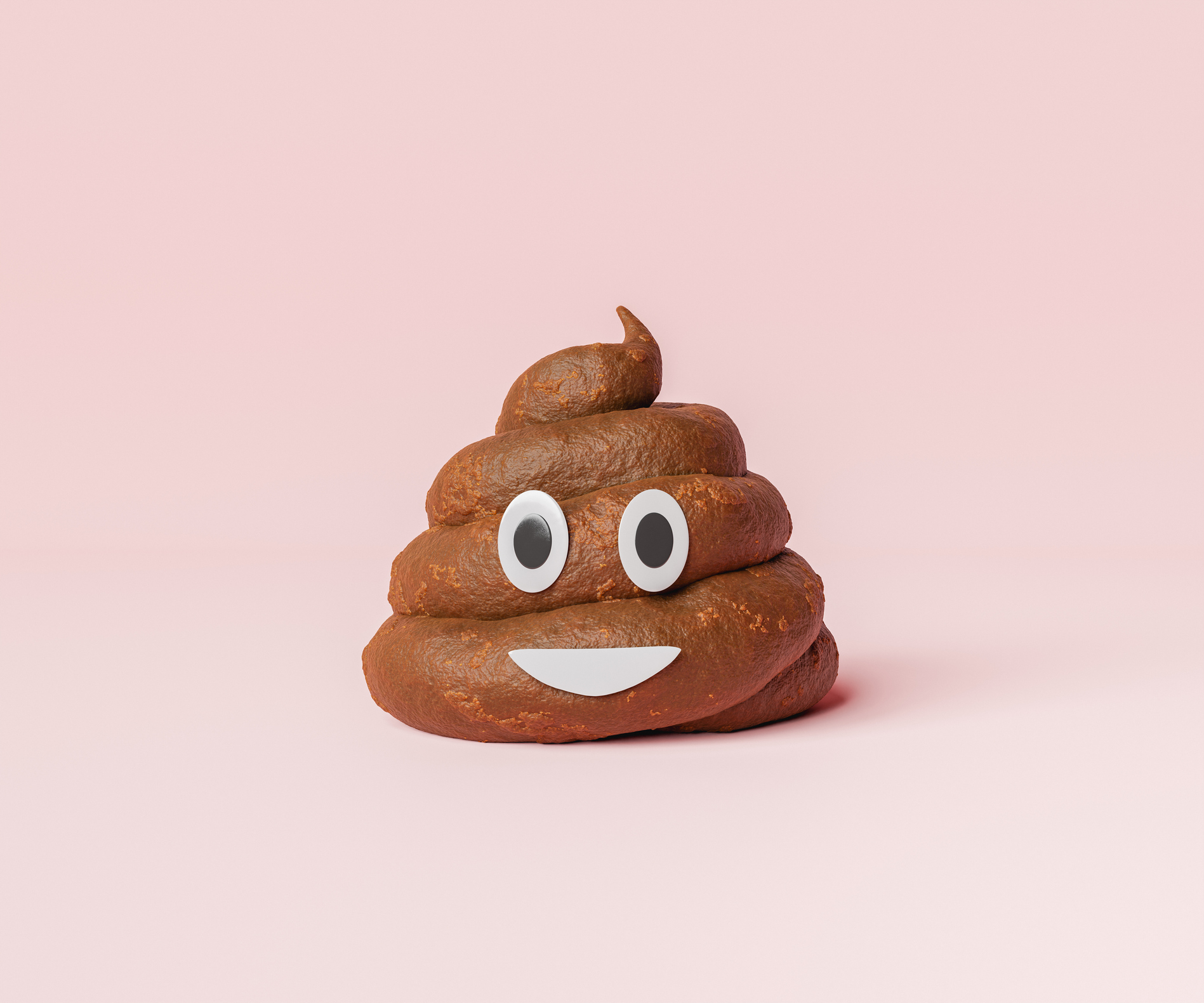 A smiling poop emoji figure against a plain background