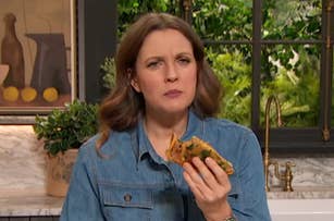 Drew Barrymore eating a grilled cheese sandwich