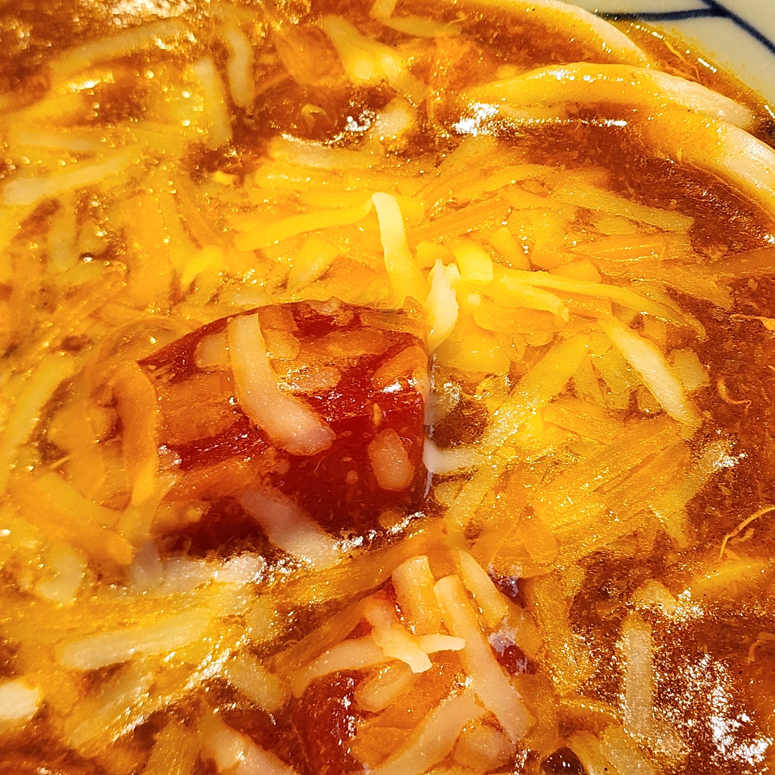 丸亀製麺のおすすめフード「とろける3種のチーズトマたまカレーうどん」