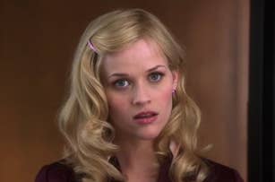 Reese Witherspoon as Elle Woods in a scene looking surprised