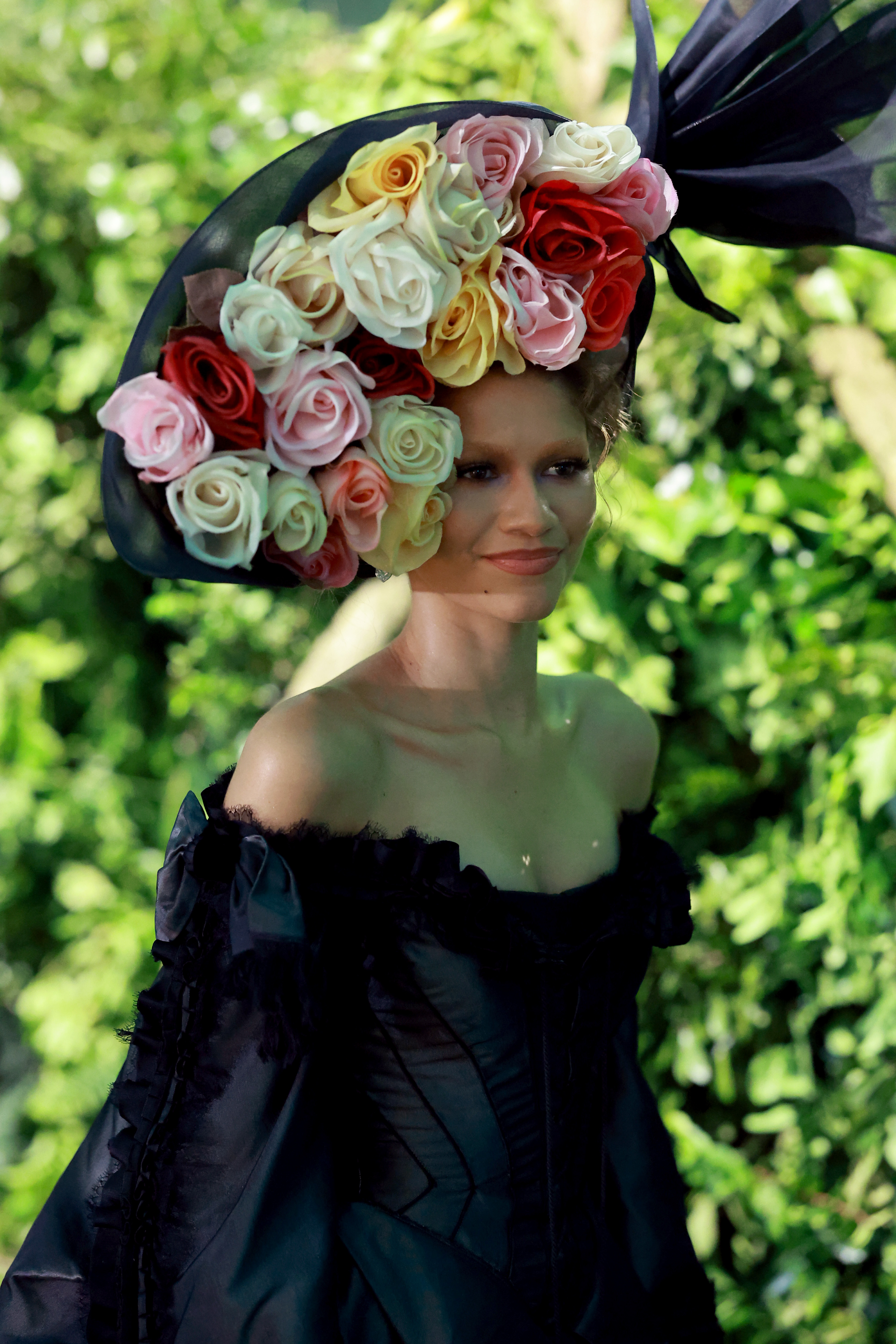 Closeup of Zendaya at the Met Gala with a large floral headpiece