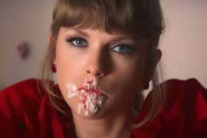 Taylor Swift with smeared frosting on her face in the I Bet You Think About Me music video