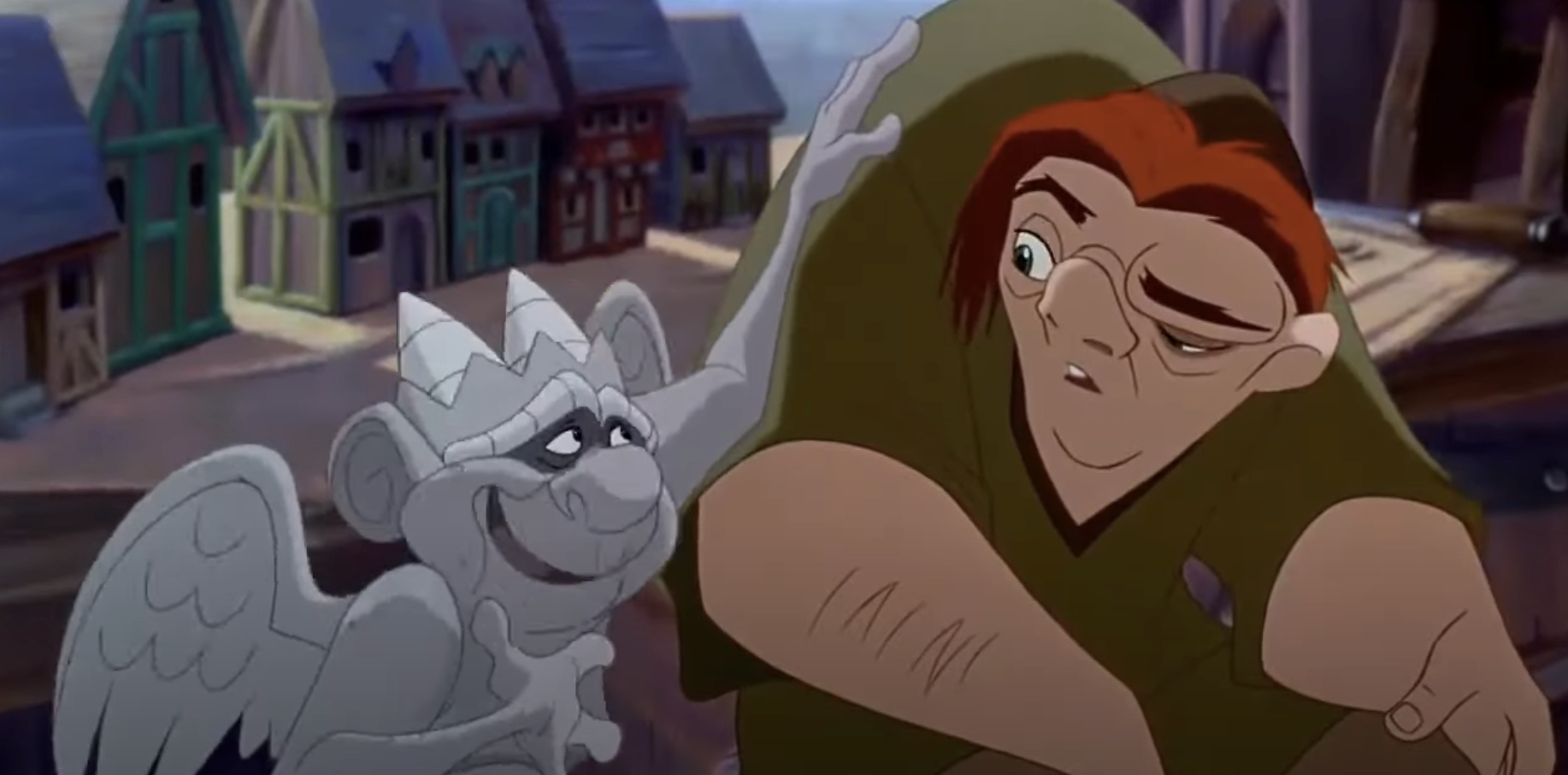 Animated characters Quasimodo and gargoyle Hugo from &quot;The Hunchback of Notre Dame&quot; in a scene together