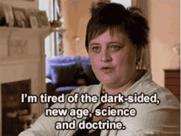 Woman sitting, expressing frustration with hands, captioned with her views opposing certain beliefs