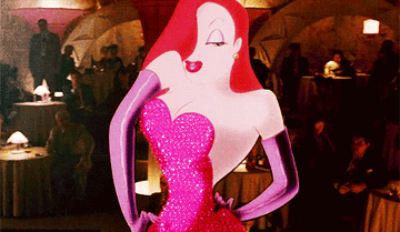 Animated character Jessica Rabbit in a sparkling strapless dress, singing onstage