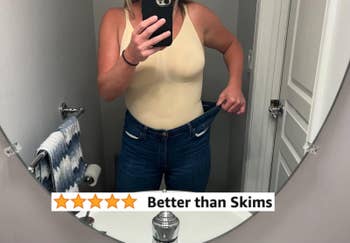reviewer wearing the beige bodysuit