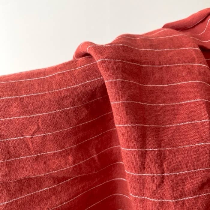 無印良品のおすすめファッションアイテム「婦人 リネン 洗いざらしスタンドカラー七分袖ブラウス」