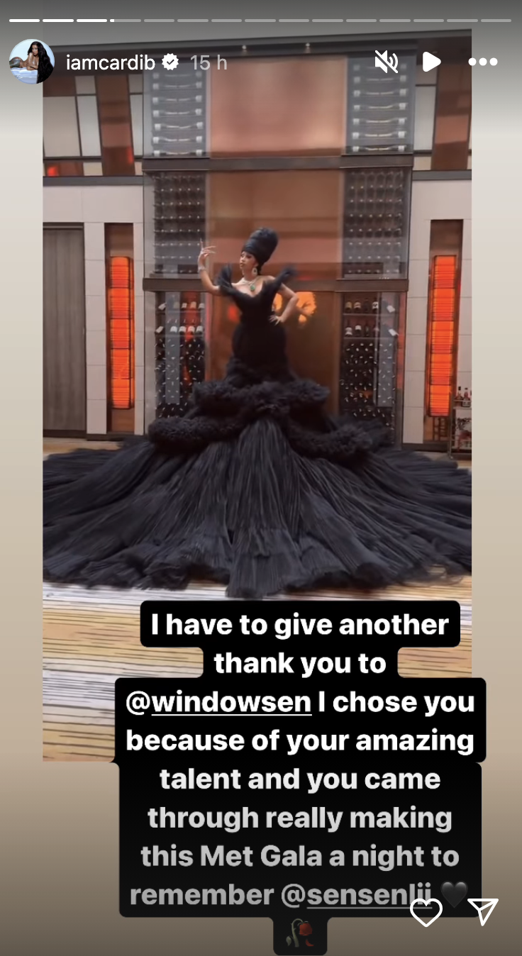 Cardi B in a voluminous black gown with a fitted bodice, posing on stairs; text overlay thanks Met Gala sponsor