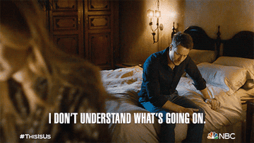 GIF from &quot;This Is Us&quot; showing a confused man sitting on a bed with a woman lying down, and text &quot;I don&#x27;t understand what&#x27;s going on.&quot;