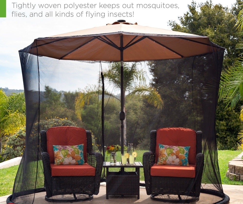 Outdoor patio set with seating and a bug net canopy, text highlights protection from insects. Note: Umbrella sold separately