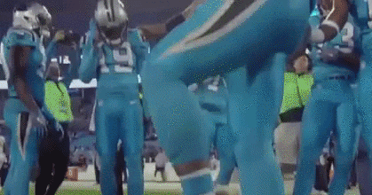 Animated mascot dancing during a football game for crowd entertainment