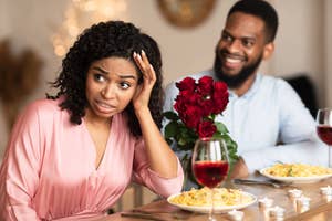 Woman appears confused on a date, man smiles with roses on table