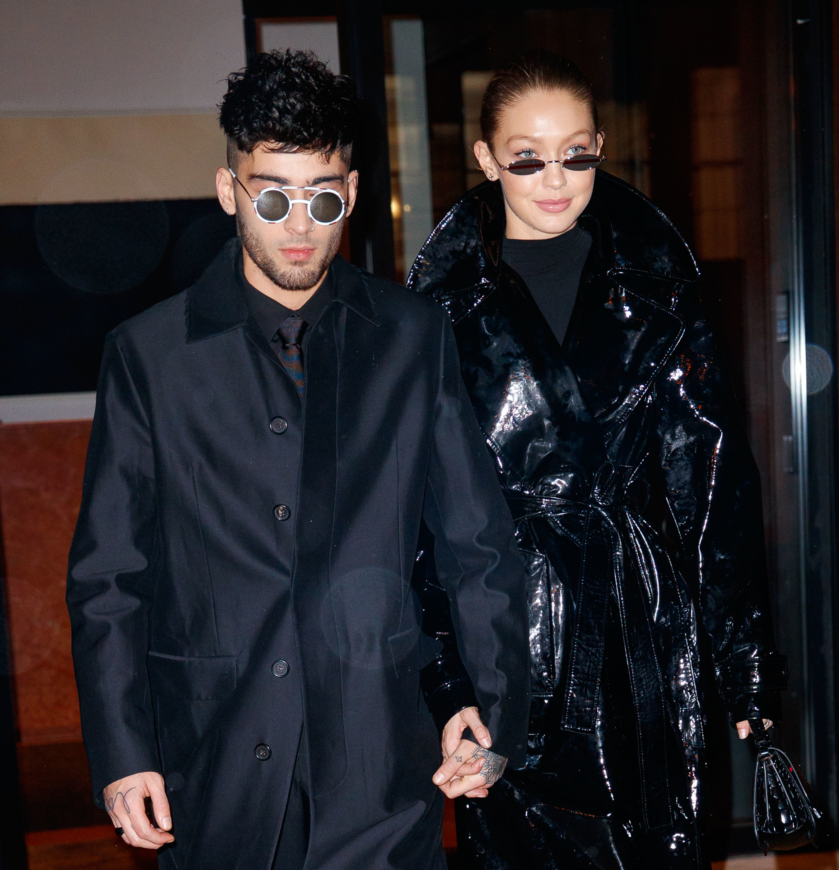 Zayn Malik and Gigi Hadid in chic outfits walking hand in hand