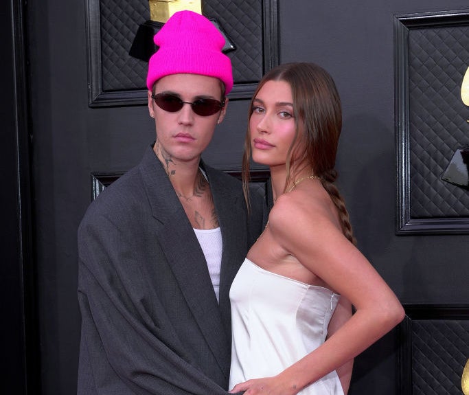 Closeup of Justin and Hailey Bieber on the red carpet