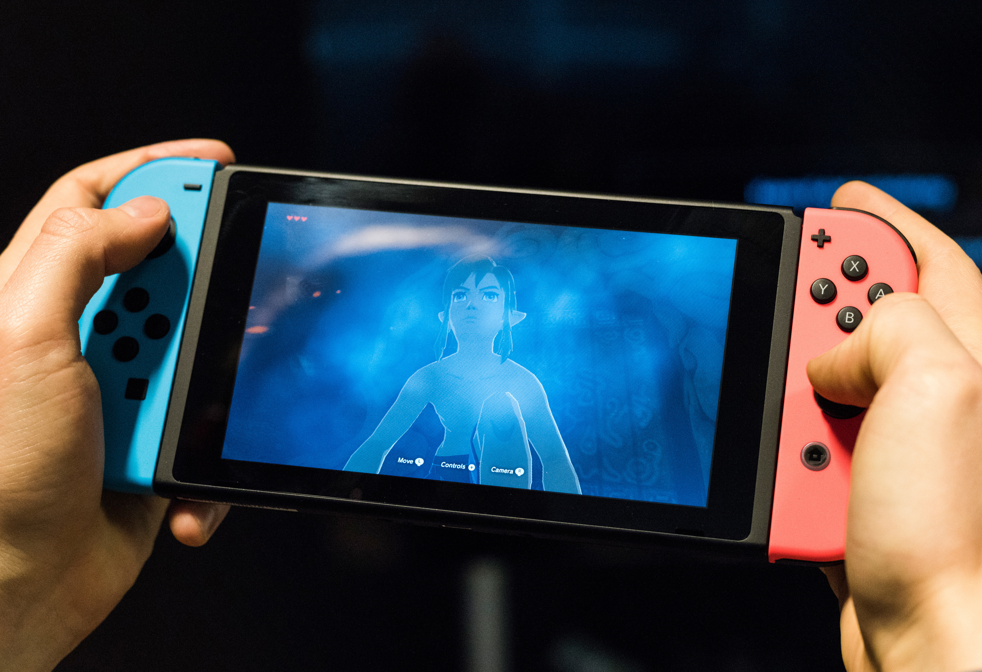 A man playing the Nintendo Switch in Berlin, Germany, 01 March 2017. Photo: Christophe Gateau/dpa | usage worldwide (Photo by Christophe Gateau/picture alliance via Getty Images)