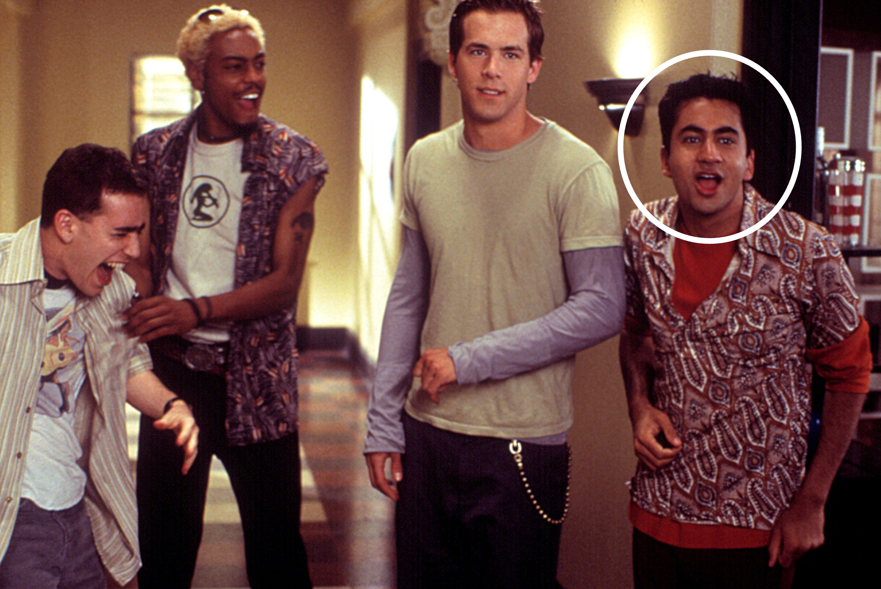 Jason Winter, Teck Holmes, Ryan Reynolds and Kal Penn in casual attire standing together