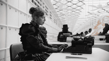 Taylor Swift typing on a typewriter in the &quot;Fortnight&quot; music video