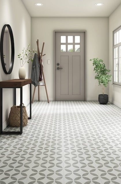 A modern entryway with geometric-patterned floor tiles