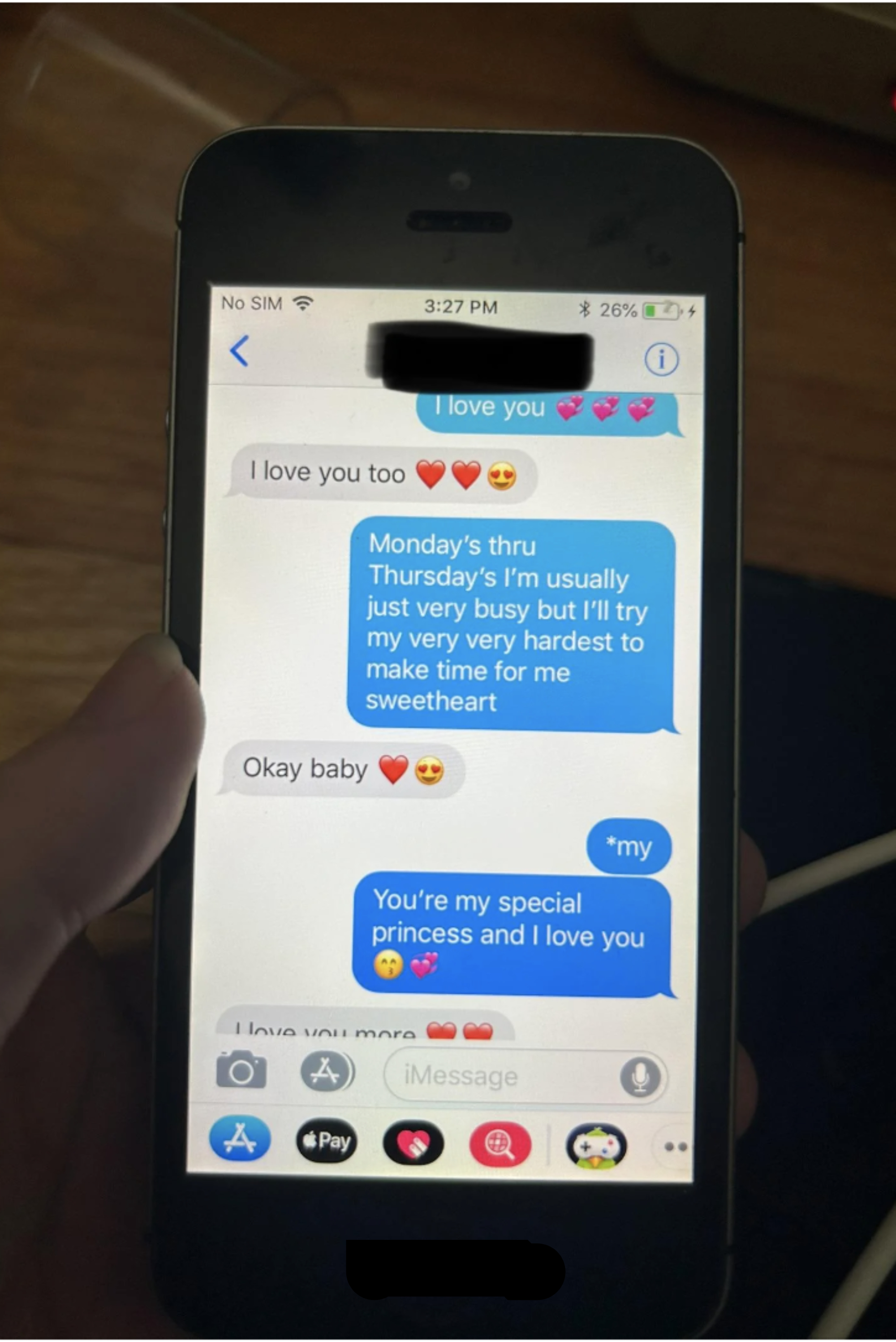 Text exchange: One person expresses love and plans to make time for their partner despite being busy. The responses are affectionate and appreciative