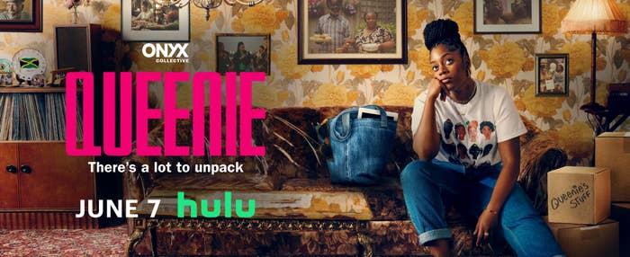 Queenie sits on a vintage sofa with a denim bag beside her. A banner reads "Queenie" and "June 7 Hulu". The backdrop is a floral wallpapered room with framed photos