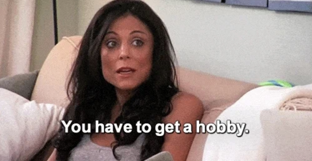 Bethenny Frankel sits on a couch with a concerned expression, with text overlay saying, &quot;You have to get a hobby.&quot;