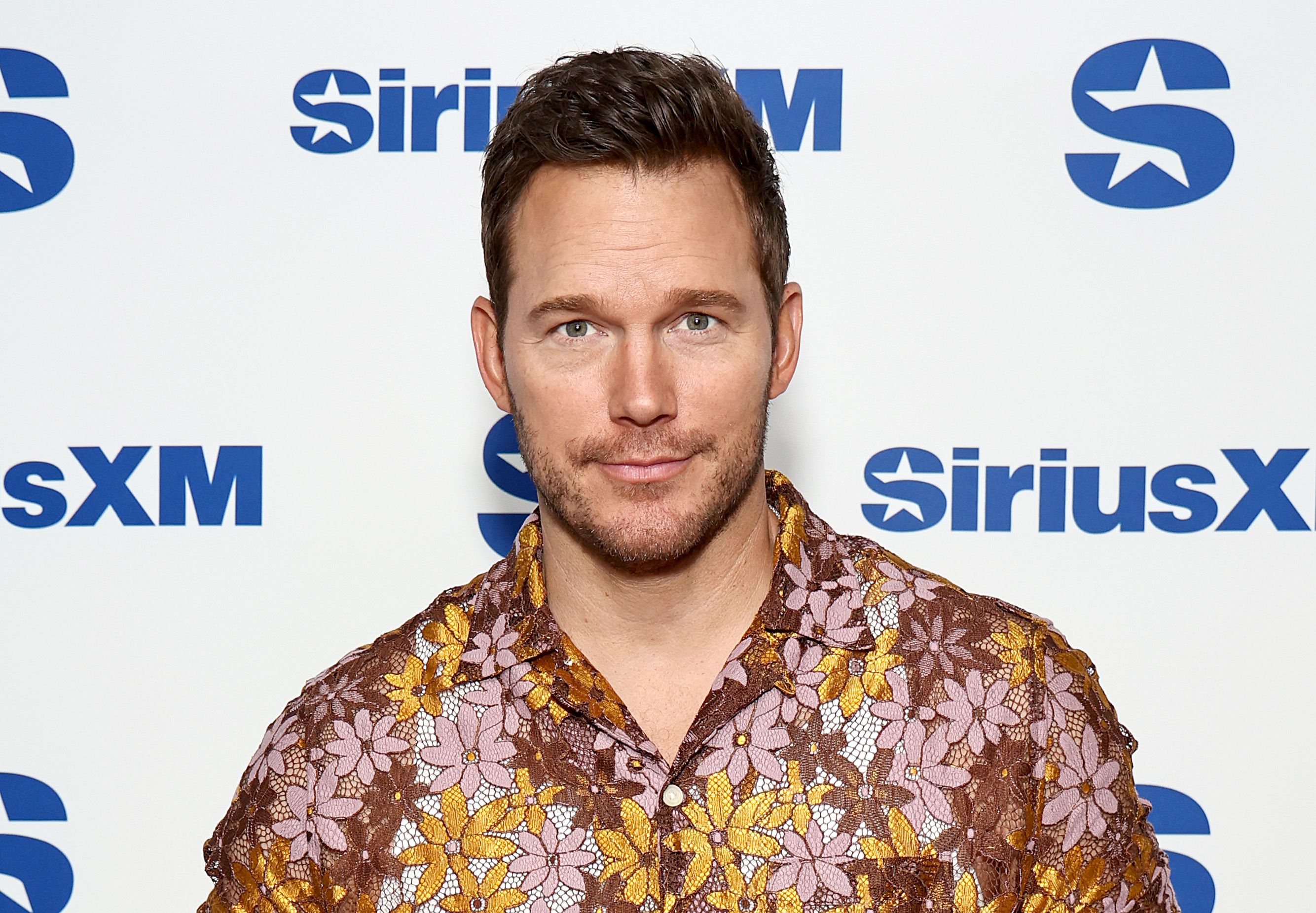Chris Pratt stands at a SiriusXM event.