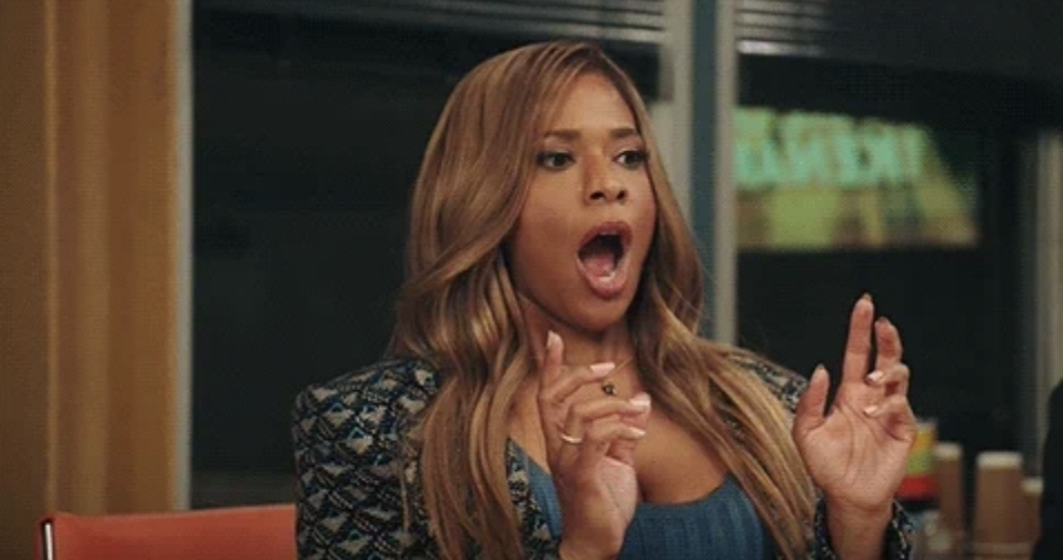 A surprised Vanessa Simmons gestures with her hands up during a conversation