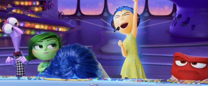 Fear, Disgust, Sadness, Joy, and Anger at the central control panel in headquarters, with Joy celebrating enthusiastically in &quot;Inside Out 2&quot;