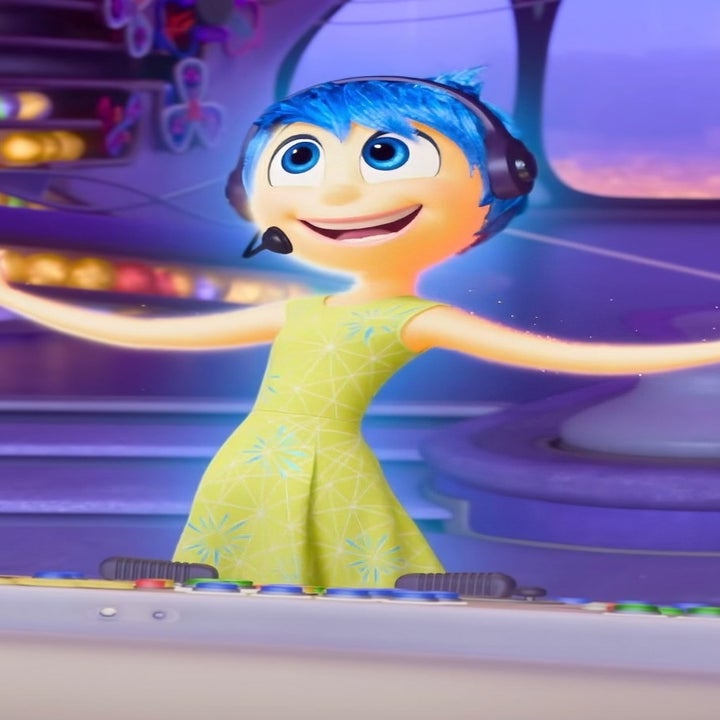 Joy from "Inside Out 2" operating the control console in Headquarters