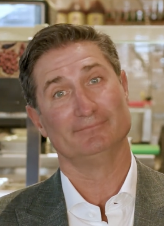 Chipotle CEO looking at the camera and tilting his head. Caption text reads, "is kind of like—"