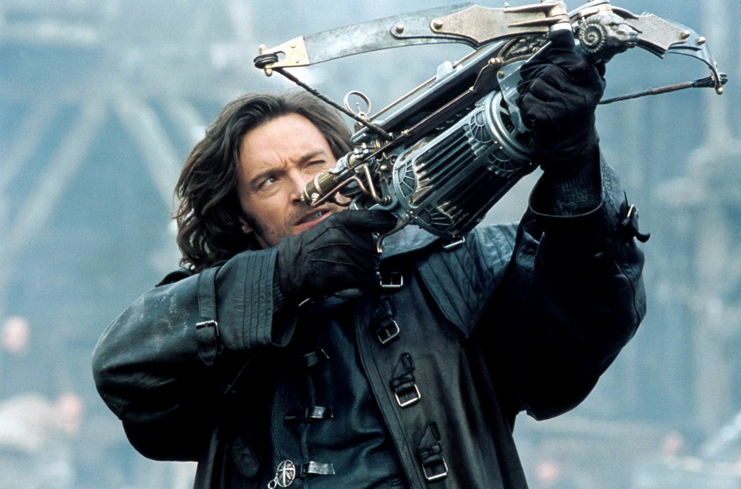 A person holding a crossbow and aiming, wearing dark and rugged medieval-style clothing with long hair, in a tense action scene