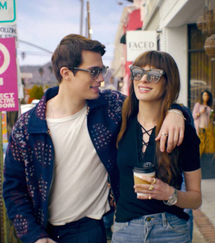 Nicholas Galitzine with his arm around Anne Hathaway in &quot;The Idea of You&quot;