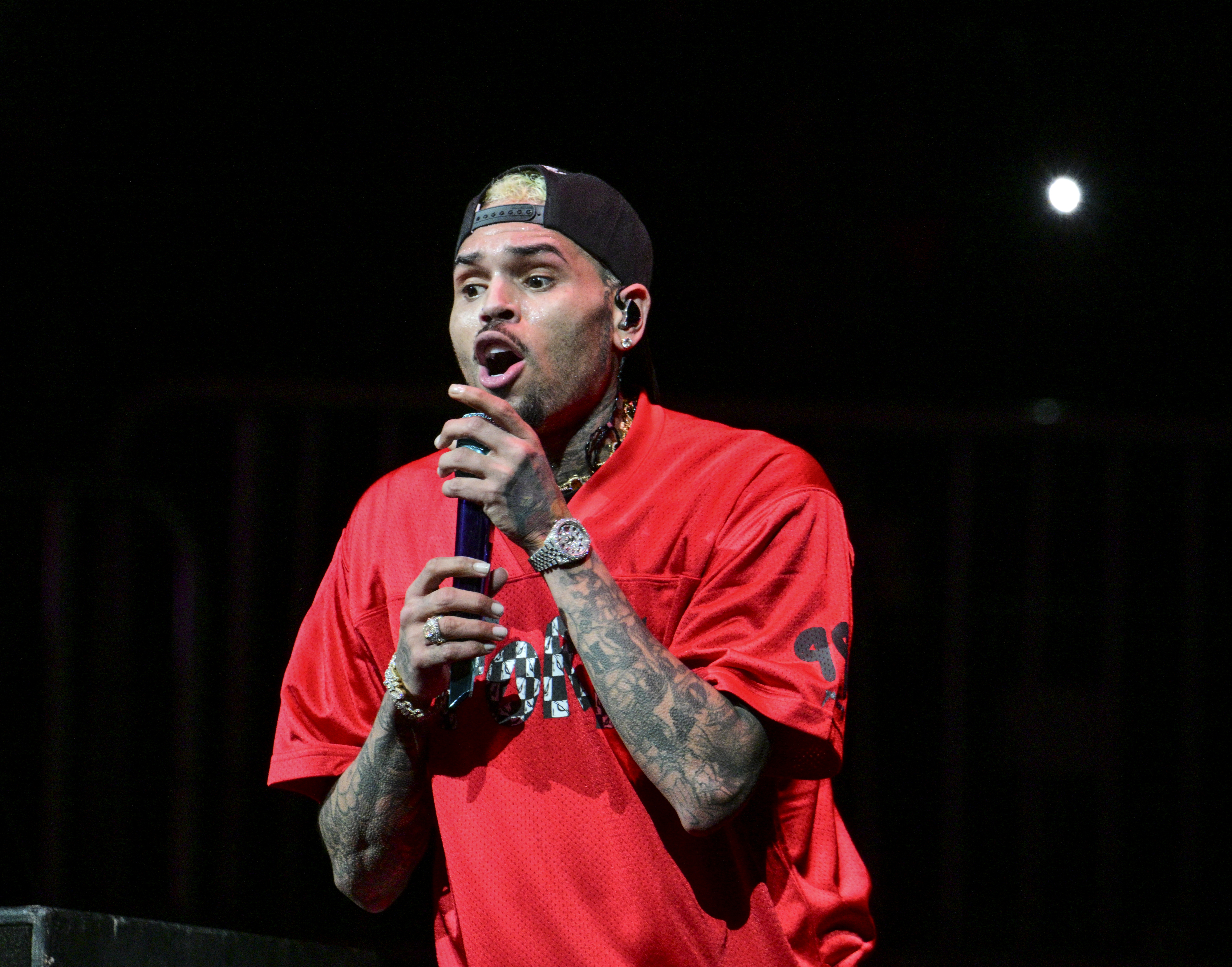 Chris Brown performs on stage in the United States.