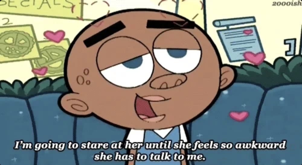 cartoon character sitting on a couch with hearts around him. Caption: "I'm going to stare at her until she feels so awkward she has to talk to me"