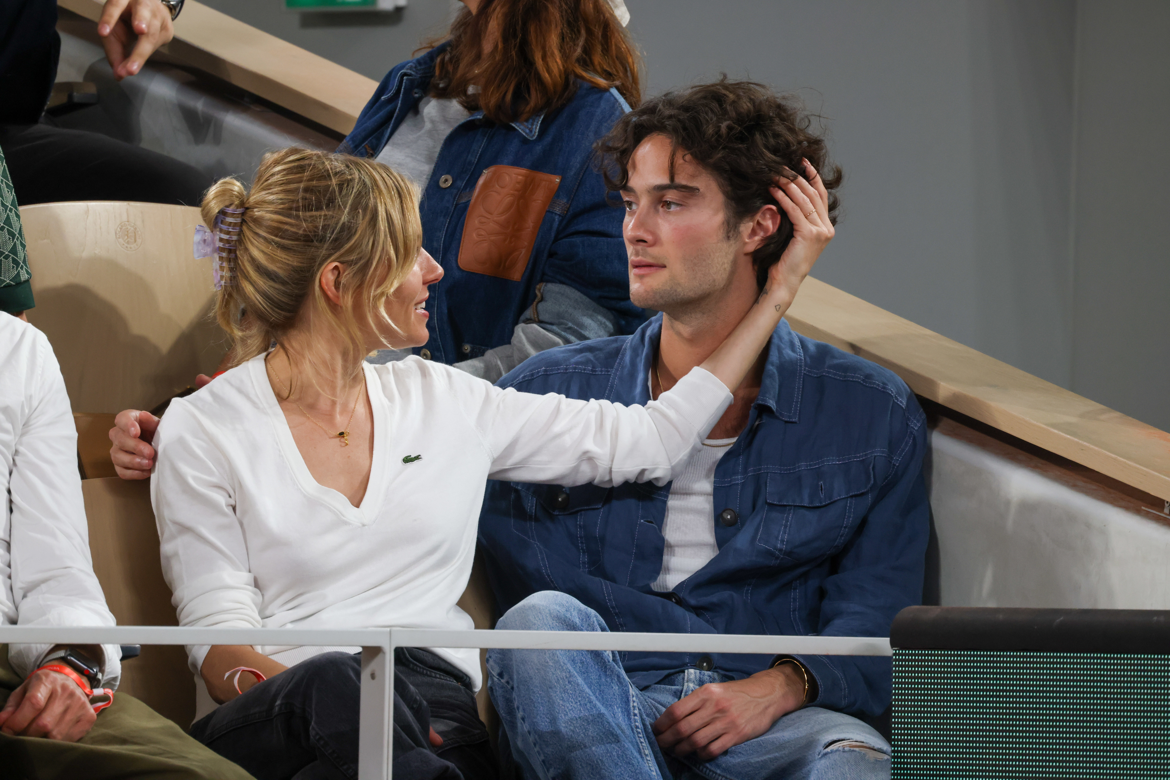 Closeup of Sienna Miller and Oli Green
