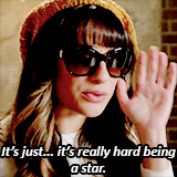 Lea Michele wearing sunglasses and a beanie, saying, "It's just… it's really hard being a star."
