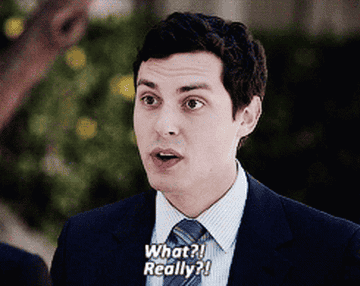 Lance Sweets, in a suit and tie, exclaims, "What?! Really?!"