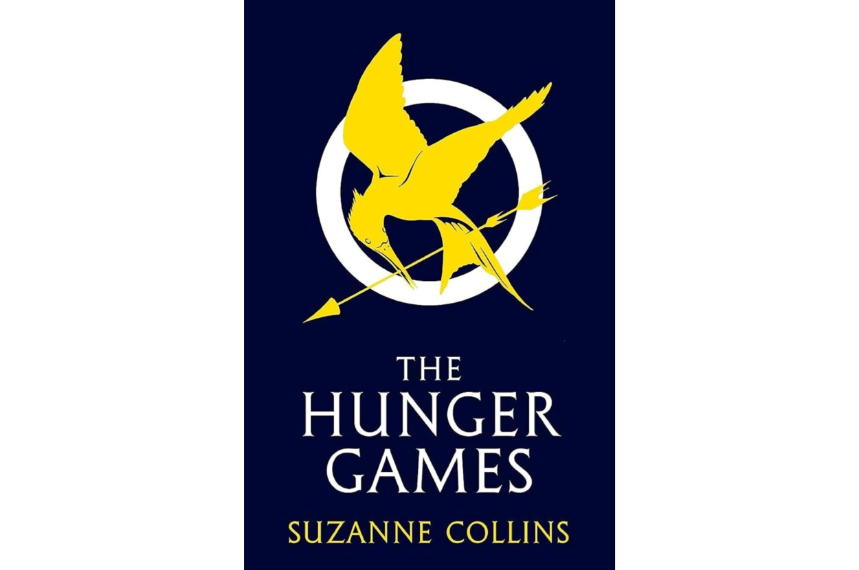 Cover of &quot;The Hunger Games&quot; by Suzanne Collins, featuring a graphic of a bird with an arrow and a circular emblem