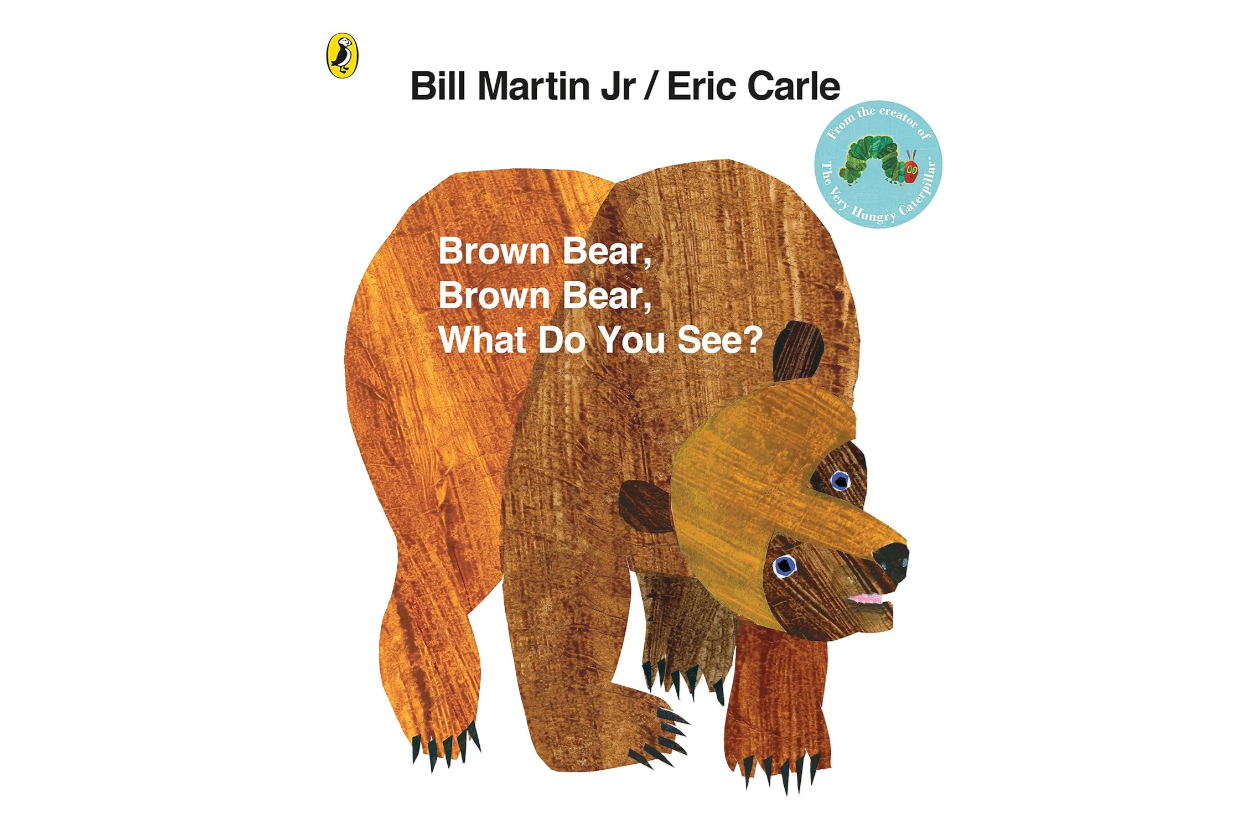 The cover of the children's book &quot;Brown Bear, Brown Bear, What Do You See?&quot; by Bill Martin Jr. and Eric Carle, featuring an illustration of a brown bear
