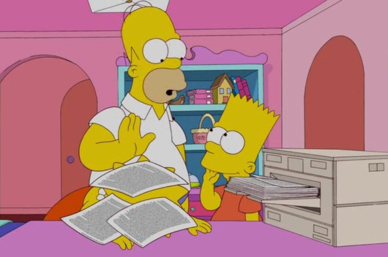 Homer Simpson is talking to Bart Simpson, who looks confused. Homer is holding printed papers next to a printer in a colorful room with a bookcase behind them